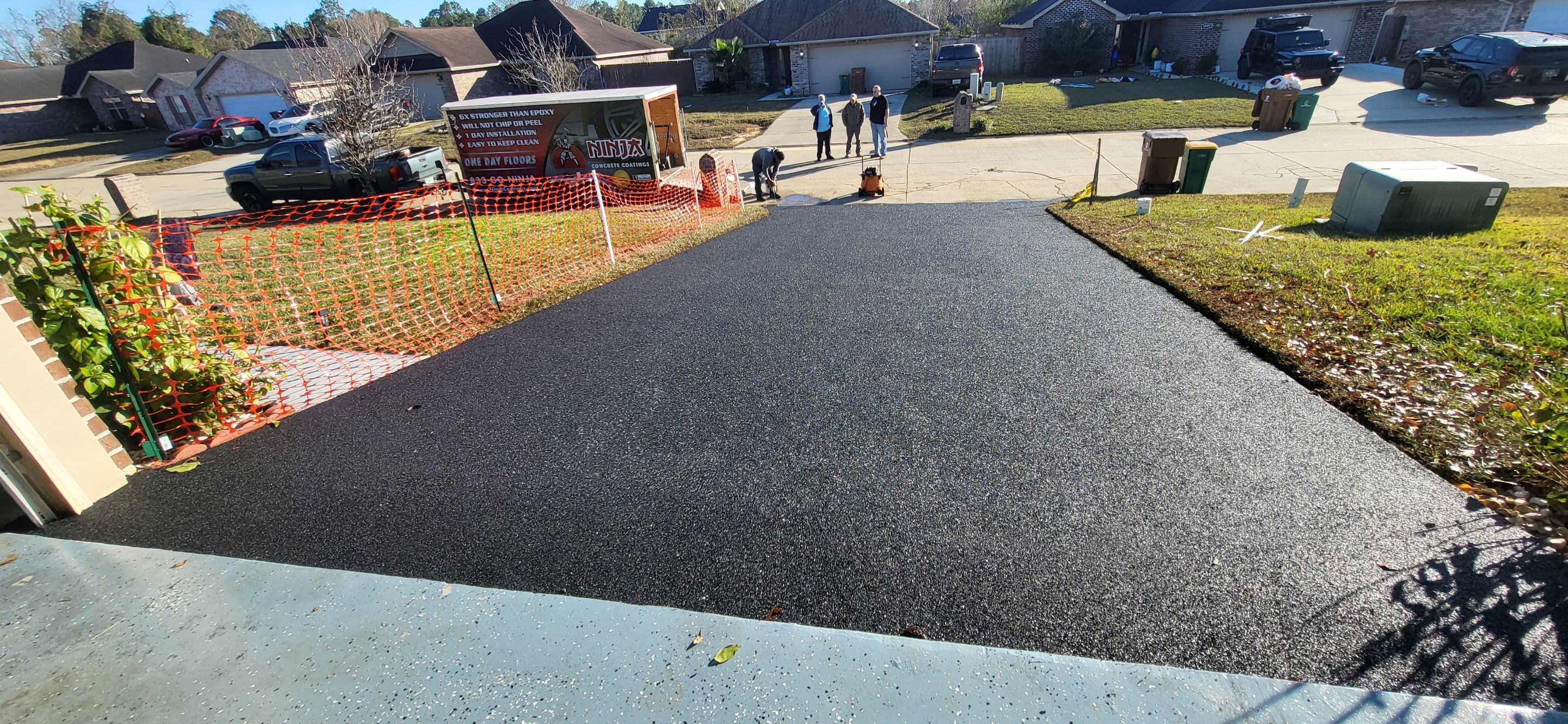 Garage floor coating Little Rock project with Fox's hand-troweled EPDM rubber finish over existing concrete