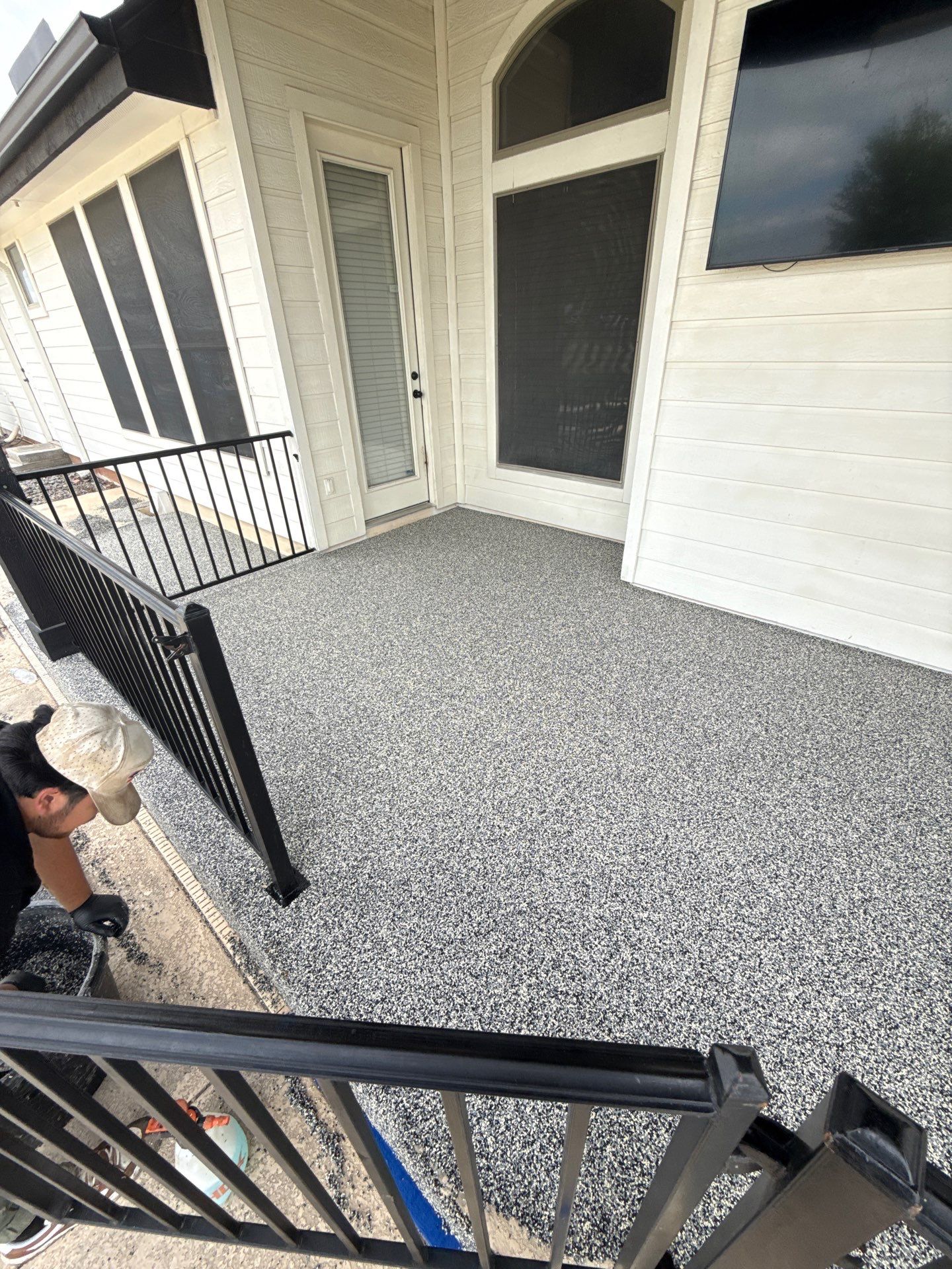 Patio resurfacing Conway AR with Fox's hand-troweled EPDM rubber finish over existing concrete